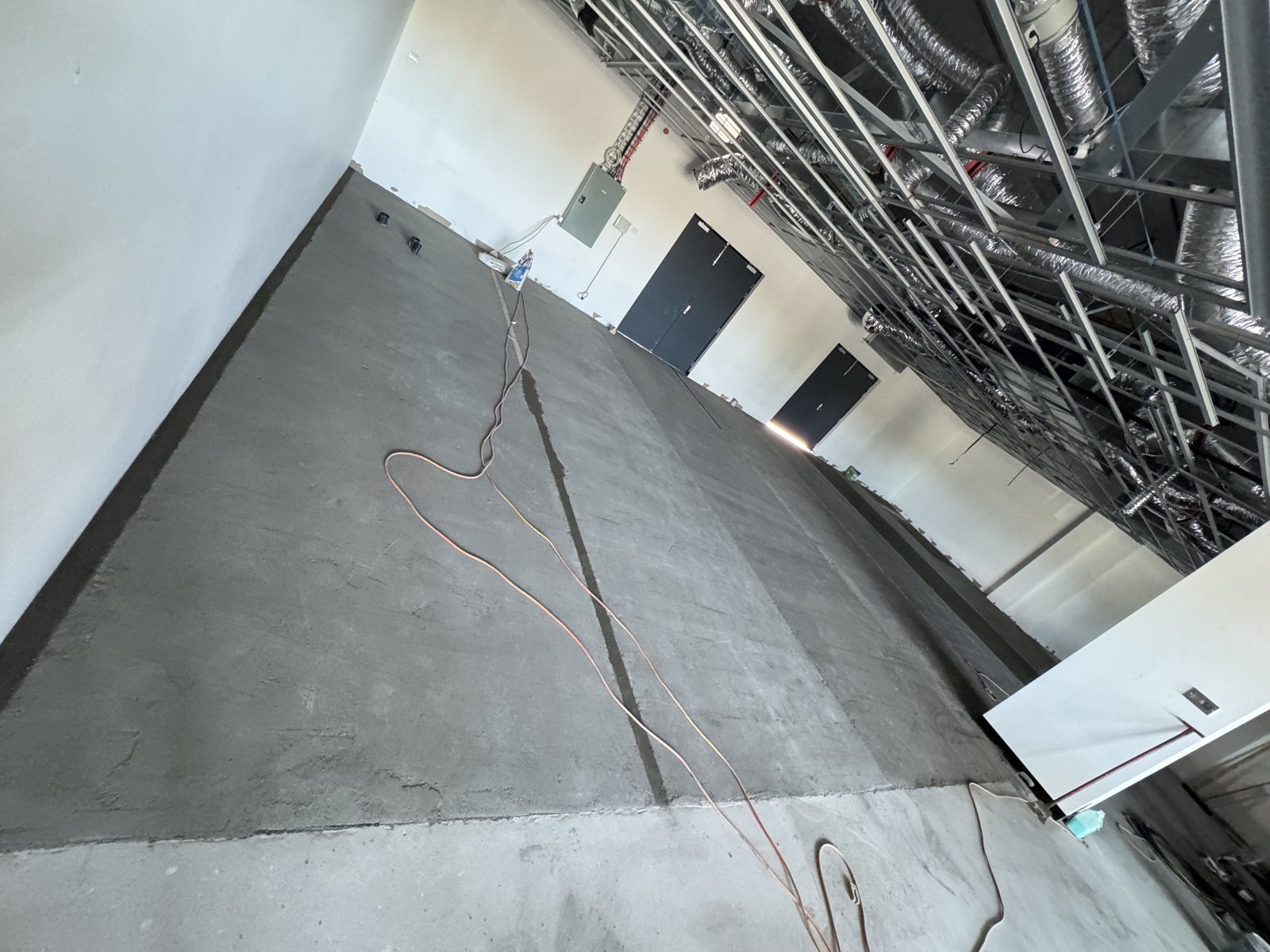 Bare concrete and steel framing as the My Kind of Vet clinic began to take shape