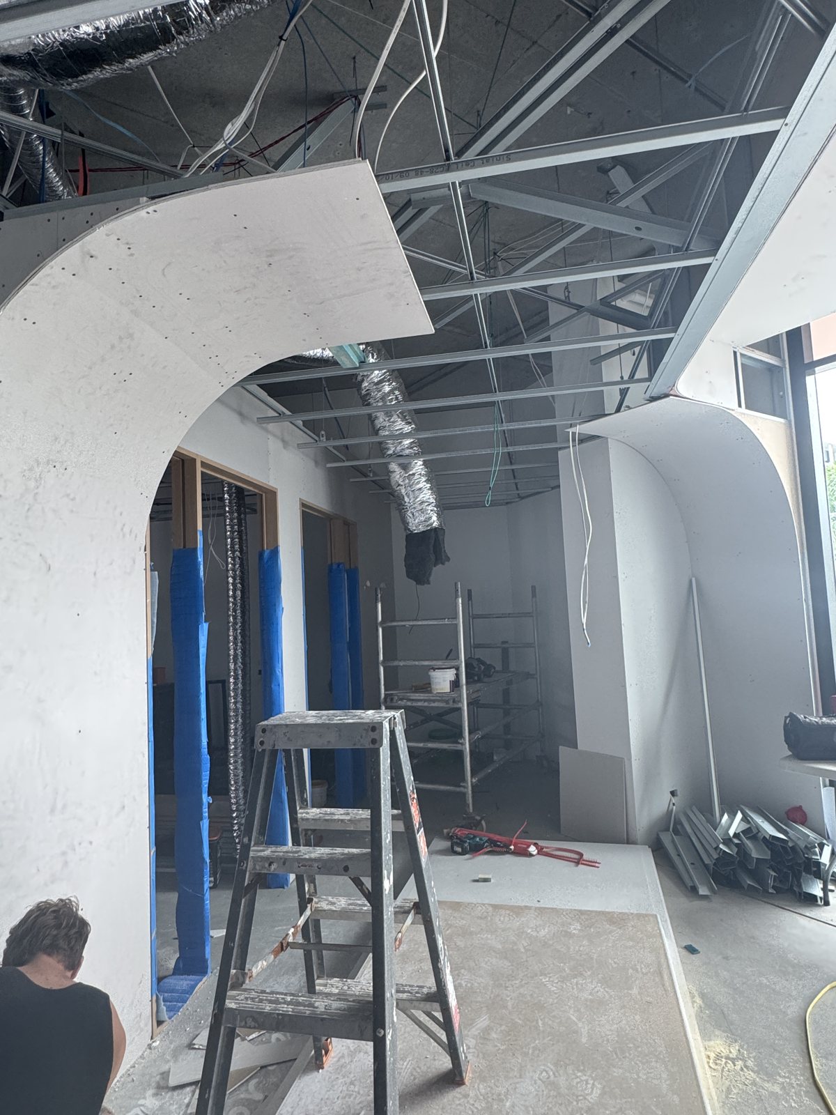 The clinic taking shape during construction — framing and fit-out in progress